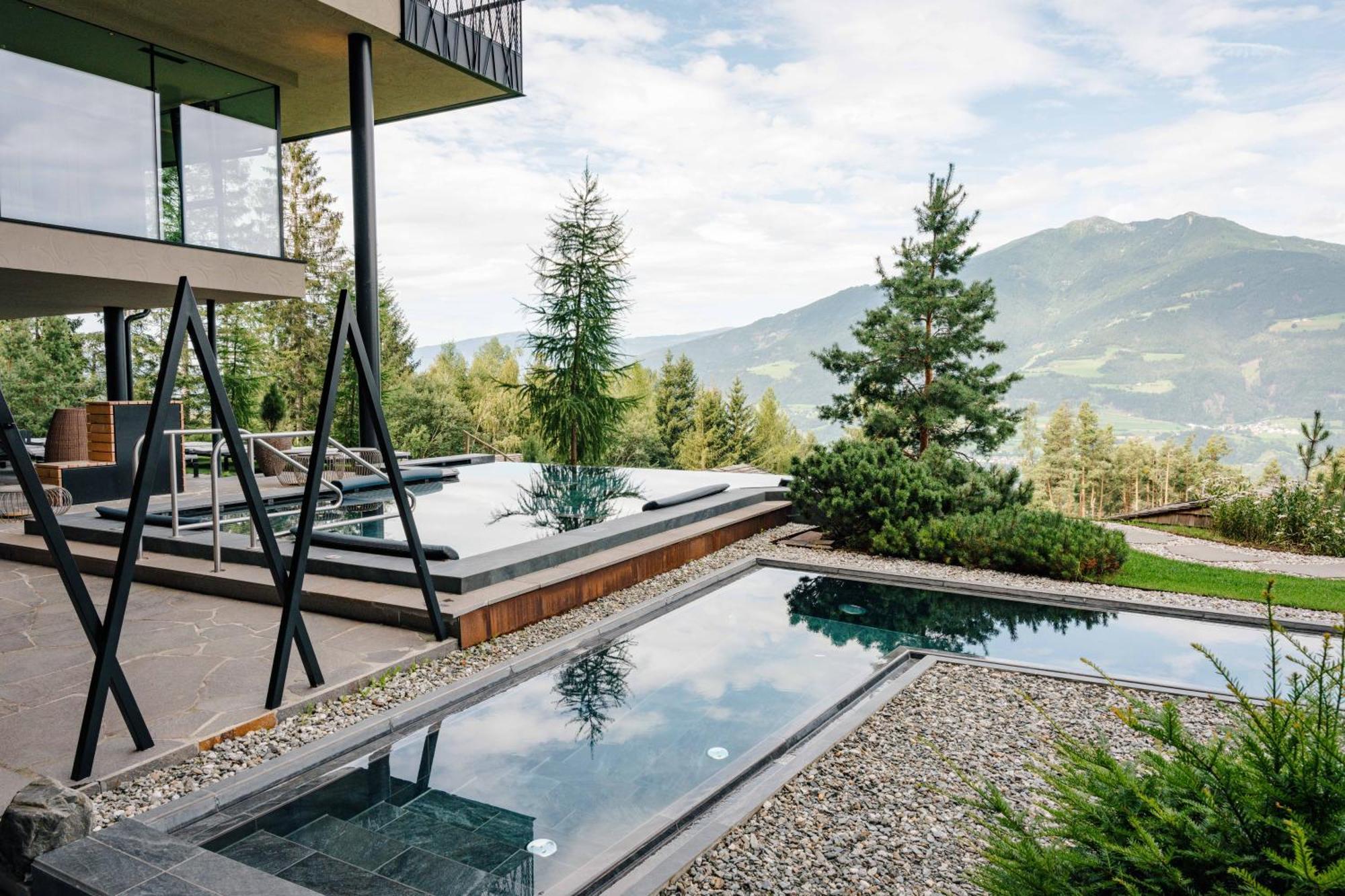 Hotel My Arbor - Dolomites à Bressanone Extérieur photo A private swimming pool in the Alps